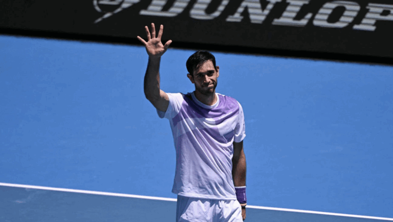 Auger-Aliassime desiste quando já perdia e Borges avança no Australian Open